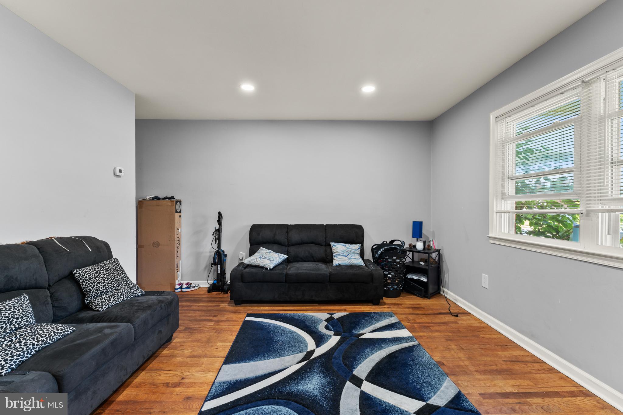 8146 Gray Haven Road Dundalk, MD 21222 - Photo 7 of 18 a living room with furniture rug and window