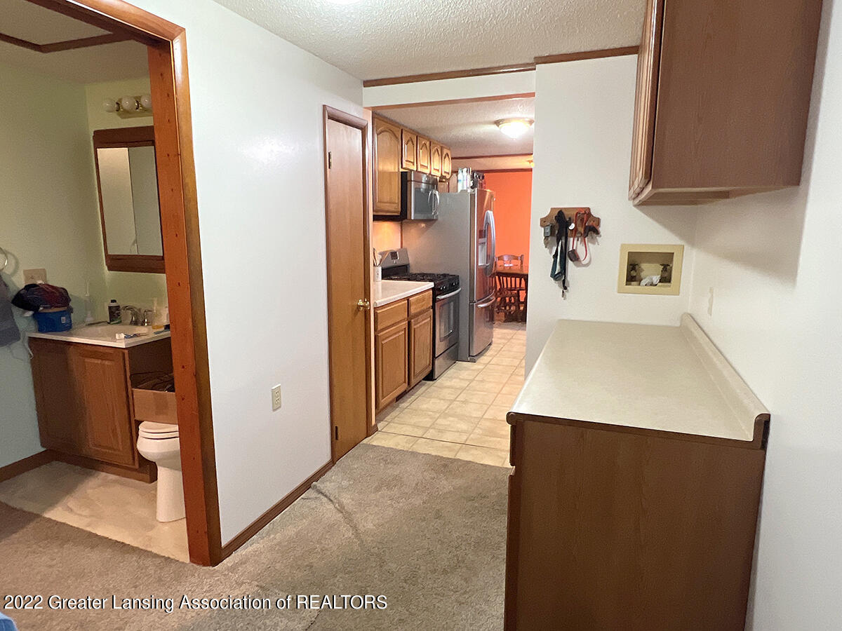 4460 Swan Road Stockbridge, MI 49285 - Photo 28 of 59 mudroom