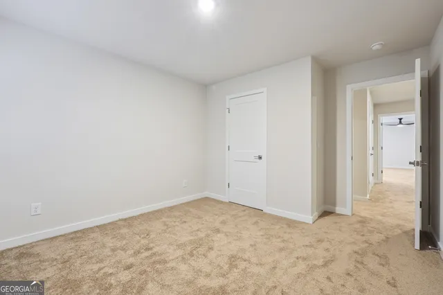 an empty room with a natural light