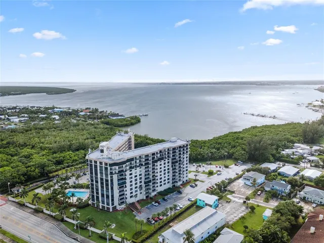 a view of a balcony with an ocean