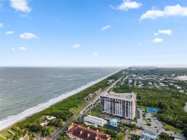 a view of city with ocean