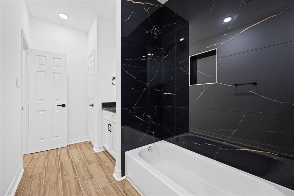 Convenient downstairs bathroom just outside the first-floor bedroom.