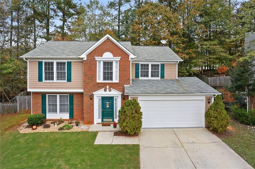 3205 Ivy Station Drive Duluth, GA 30096 - Photo 1 of 1 a front view of a house with a yard