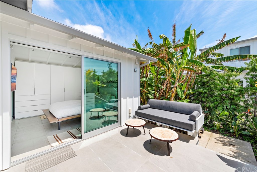 239 Fairview Street Laguna Beach, CA 92651 - Photo 34 of 67 a blue bench sitting in front of a building