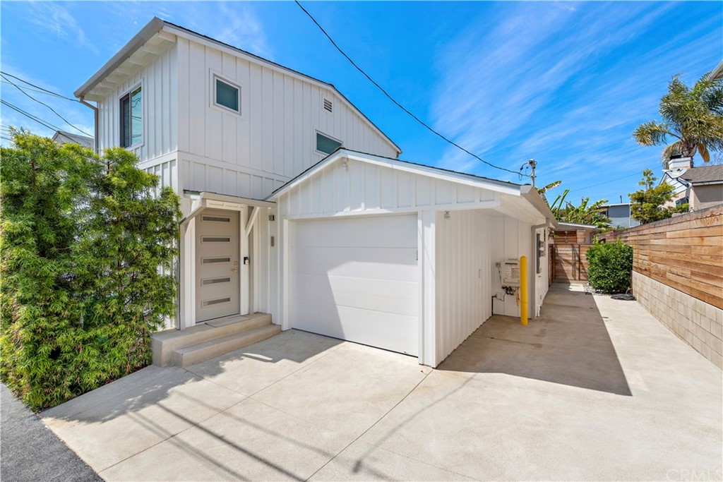 239 Fairview Street Laguna Beach, CA 92651 - Photo 43 of 67 a view of a white house with a yard