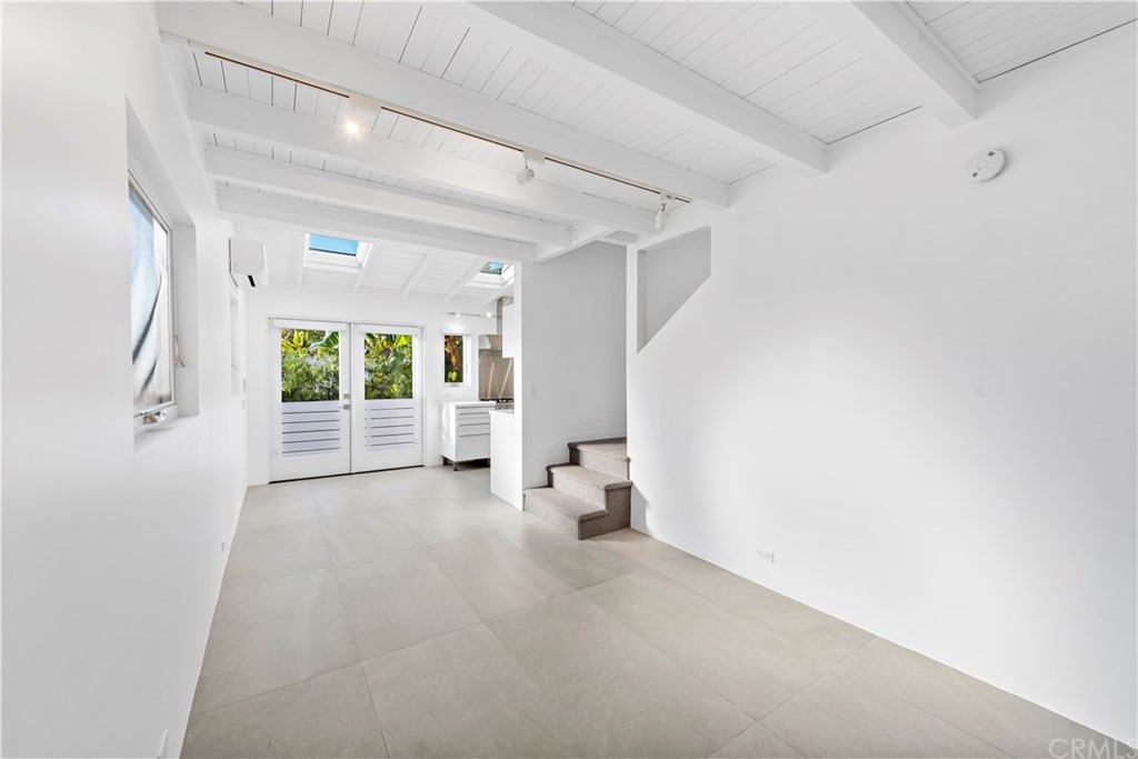 239 Fairview Street Laguna Beach, CA 92651 - Photo 65 of 67 a view of empty room with wooden floor and fan