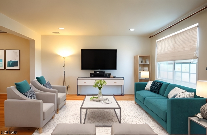 51 Truman Avenue Princeton, NJ 08540 - Photo 4 of 14 a living room with furniture and a flat screen tv