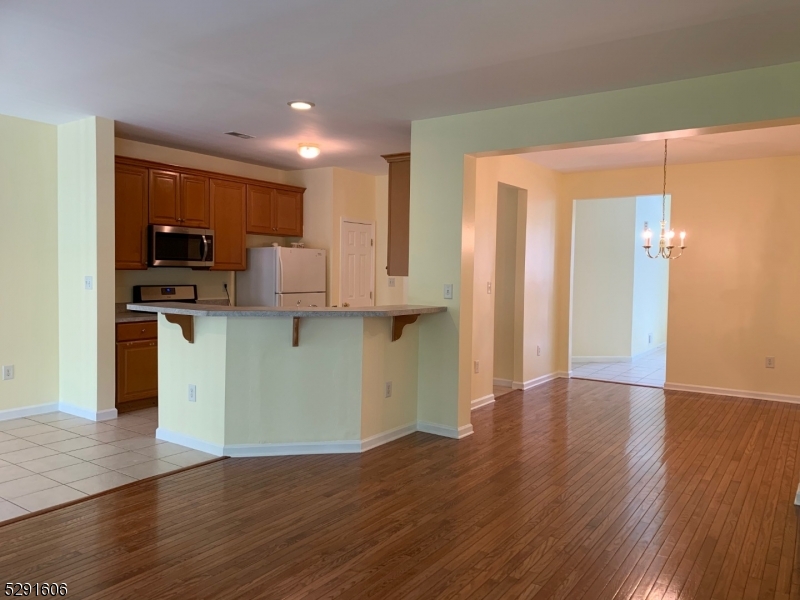 51 Truman Avenue Princeton, NJ 08540 - Photo 7 of 14 a kitchen with stainless steel appliances granite countertop a refrigerator and a stove top oven