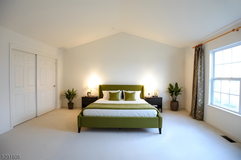 51 Truman Avenue Princeton, NJ 08540 - Photo 10 of 14 a bedroom with a bed lamp and a large window