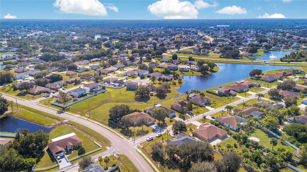 887 Adour Drive Kissimmee, FL 34759 - Photo 15 of 16 an aerial view of residential houses with outdoor space