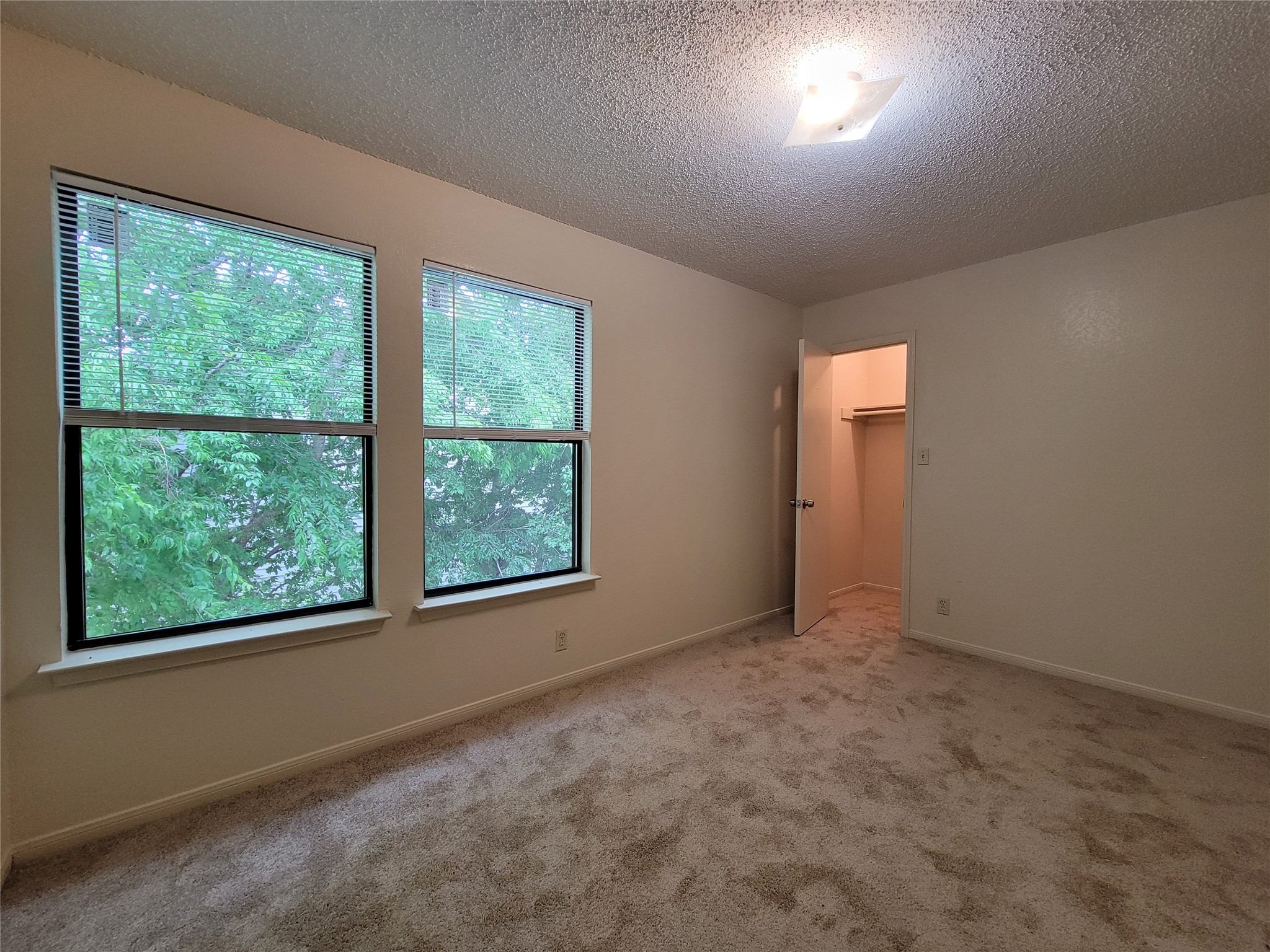 2804 Bull Run, Unit B Taylor, TX 76574 - Photo 9 of 9 an empty room with a window