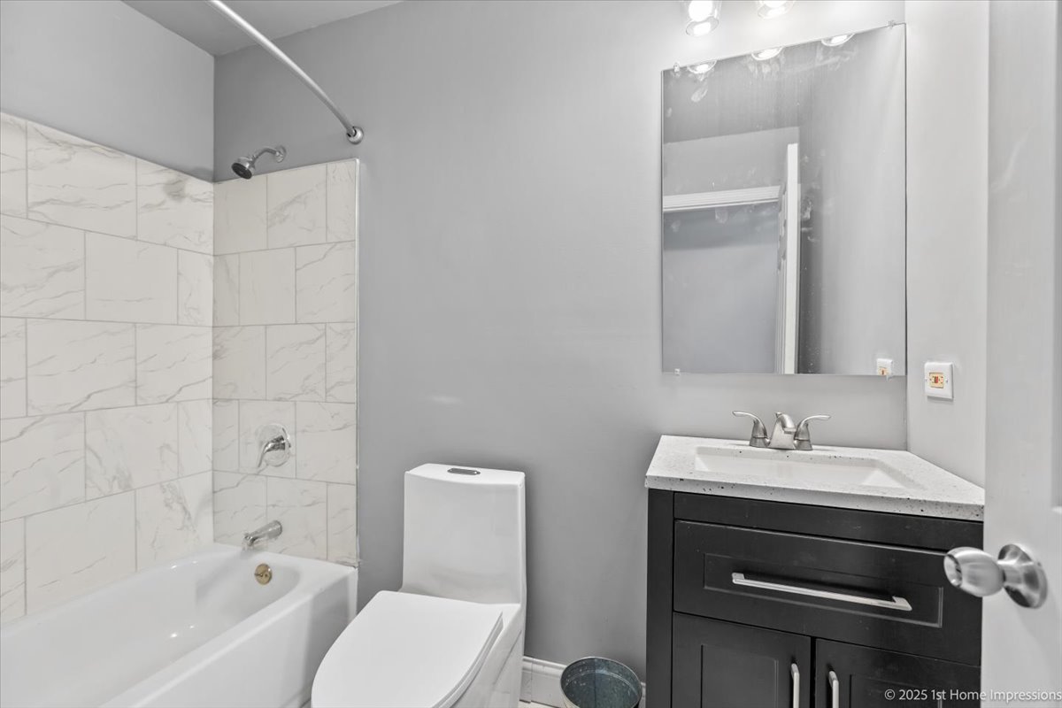 18109 Idlewild Drive Country Club Hills, IL 60478 - Photo 11 of 21 a bathroom with a sink toilet and shower