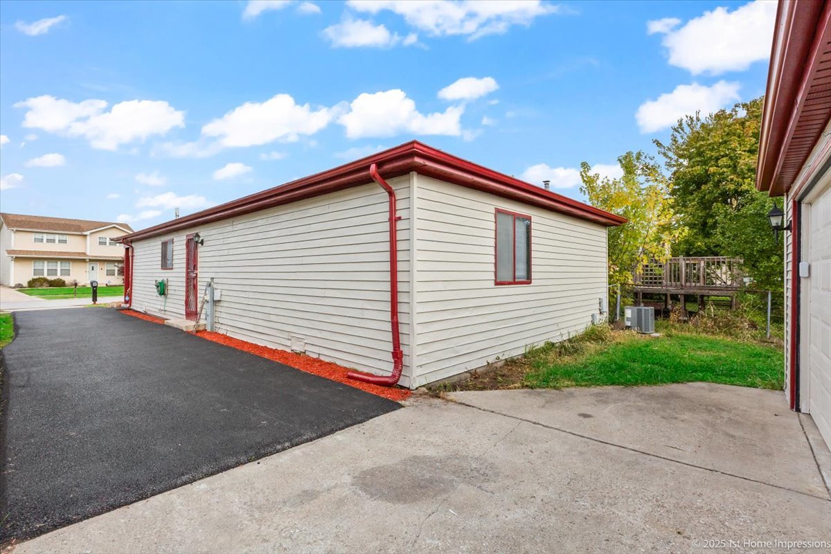 18109 Idlewild Drive Country Club Hills, IL 60478 - Photo 21 of 21 a view of a house with garage and yard