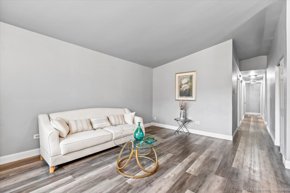18109 Idlewild Drive Country Club Hills, IL 60478 - Photo 3 of 21 a living room with furniture and a wooden floor