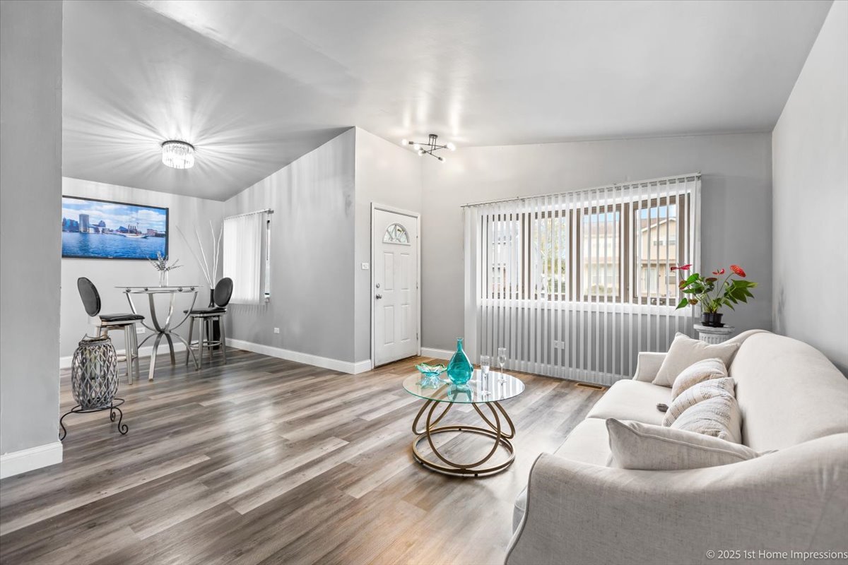 18109 Idlewild Drive Country Club Hills, IL 60478 - Photo 5 of 21 a living room with furniture and a table