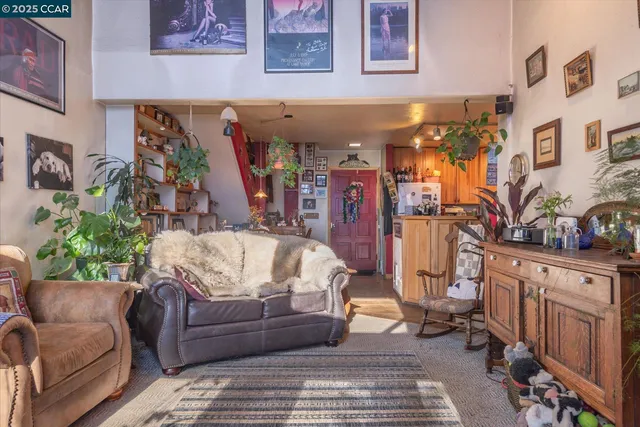 a living room with furniture and a rug