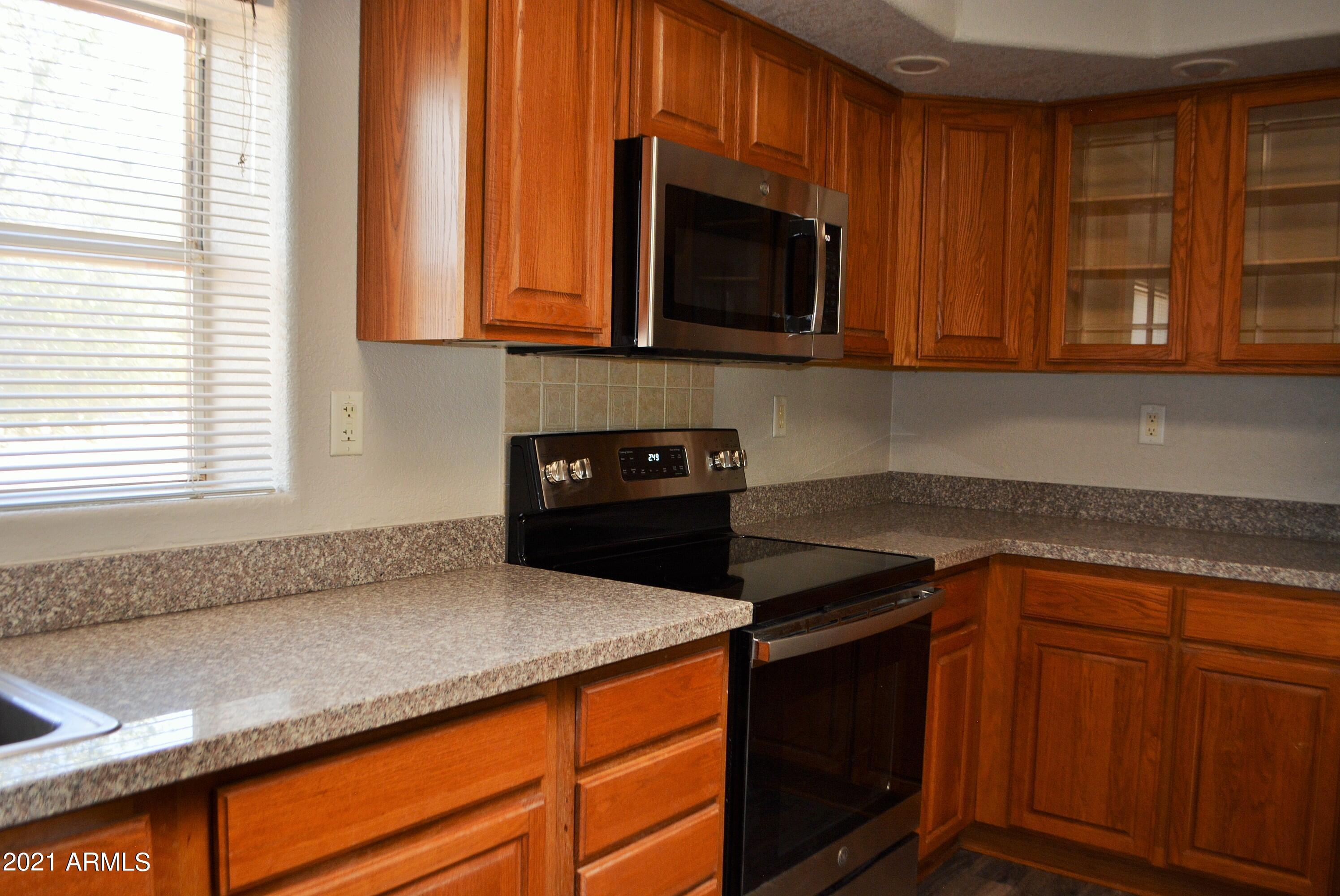 22422 Peak View Road Wittmann, AZ 85361 - Photo 19 of 29 peak view kitchen 1