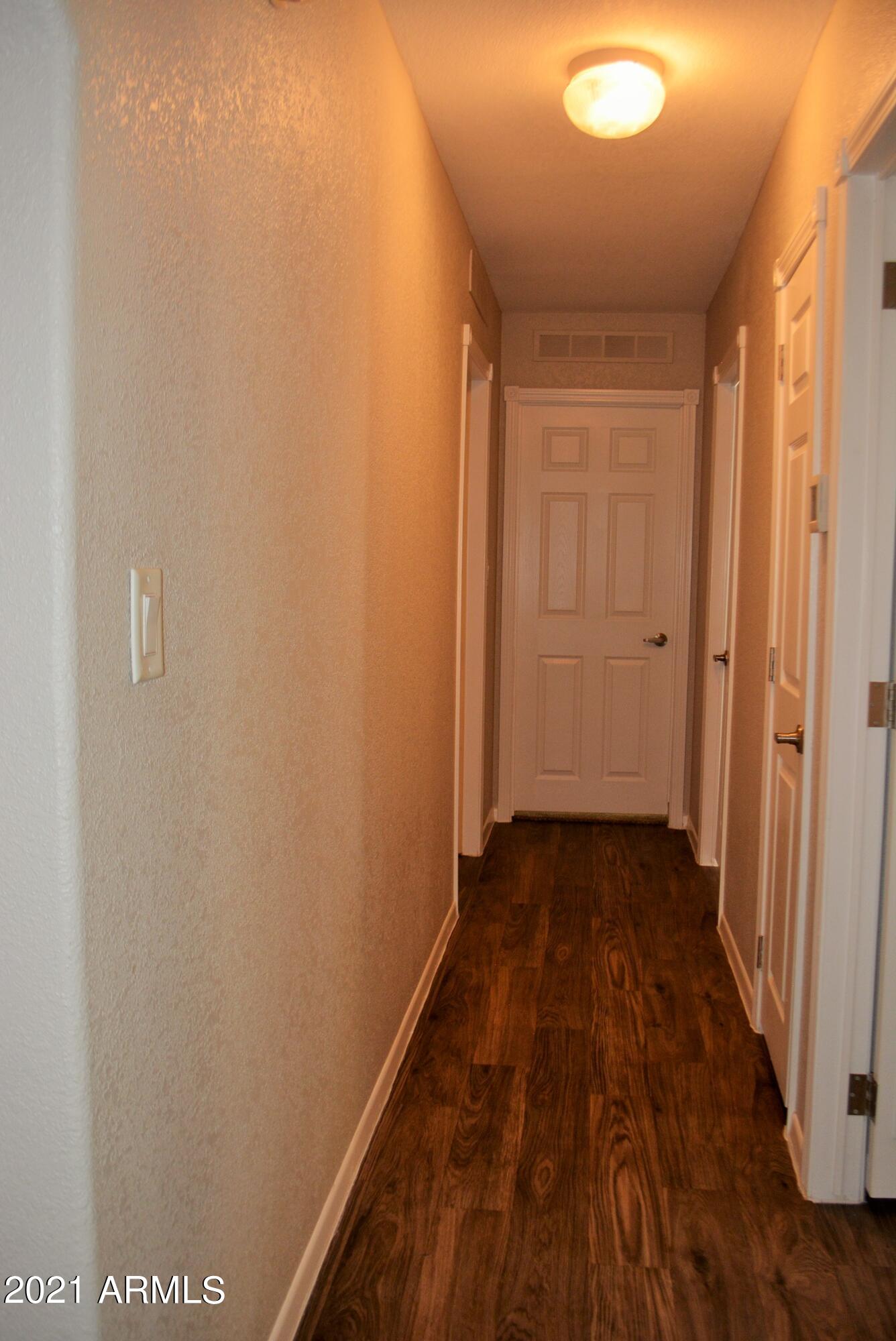 22422 Peak View Road Wittmann, AZ 85361 - Photo 3 of 29 peak view hallway