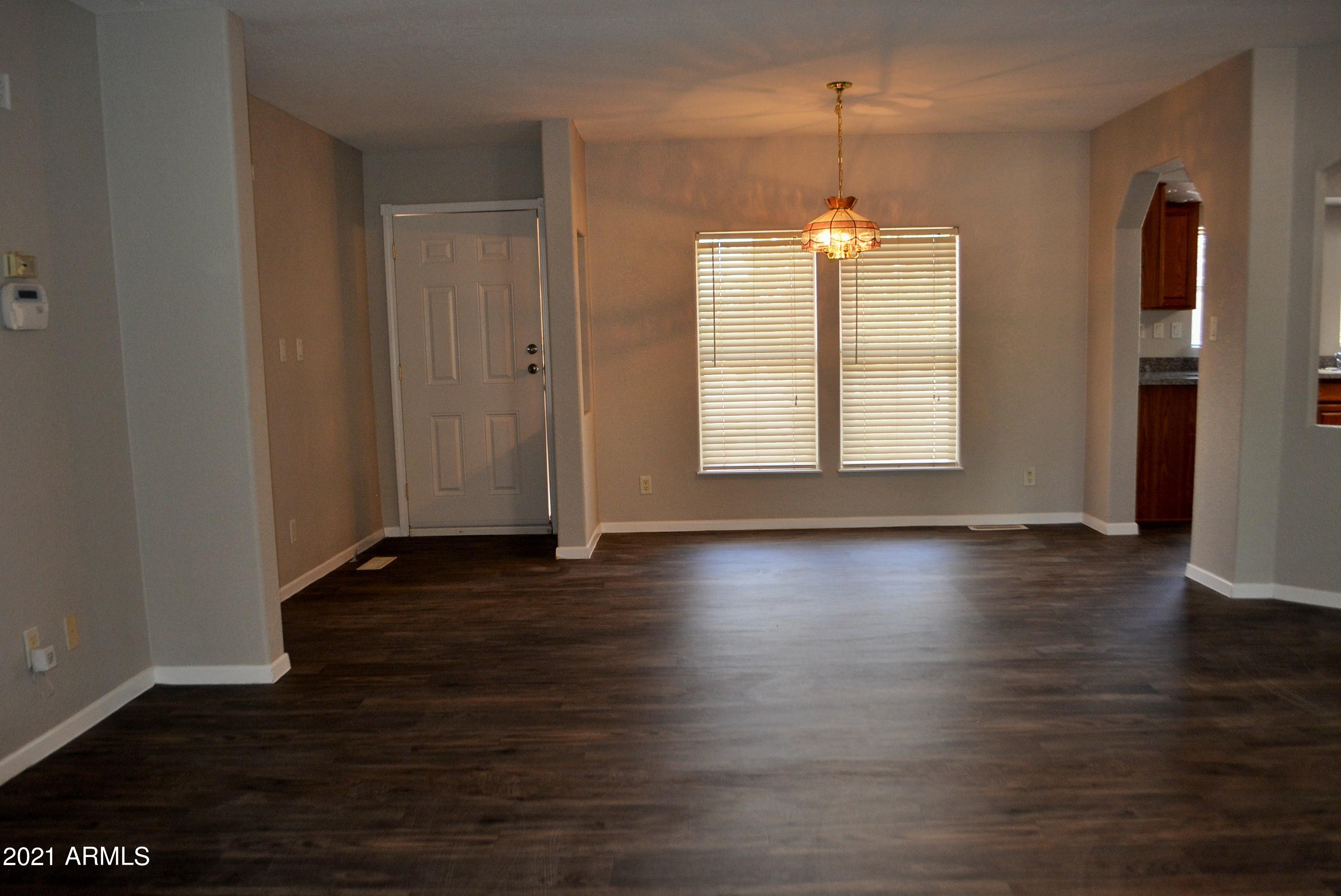 22422 Peak View Road Wittmann, AZ 85361 - Photo 4 of 29 peak view living room 1