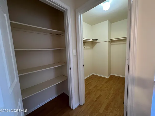 a view of an empty walk in closet