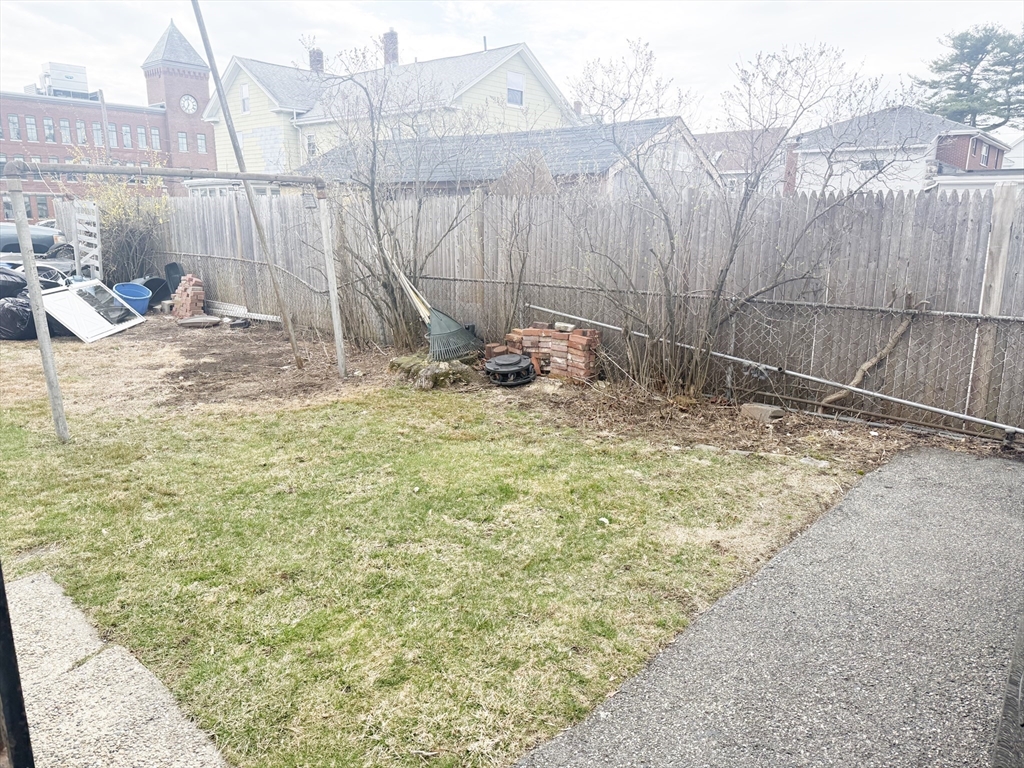37 Prospect St Avenue, Unit 2 Waltham, MA 02453 - Photo 13 of 14 a backyard of a house