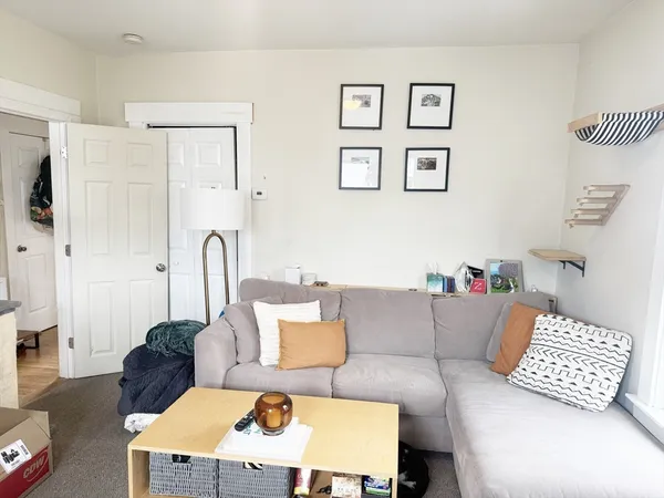 a living room with furniture and a couch