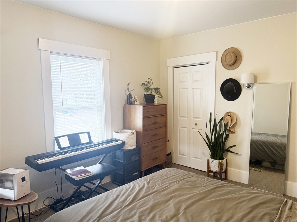 37 Prospect St Avenue, Unit 2 Waltham, MA 02453 - Photo 5 of 14 a view of a workspace with furniture