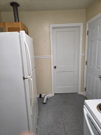 a view of room and front door