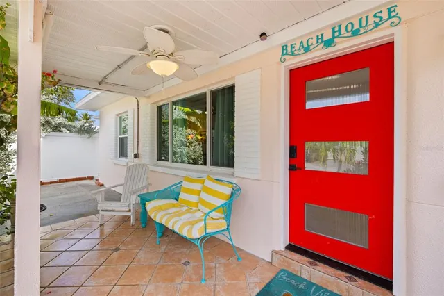 a view of a street with a cars parked in front of it