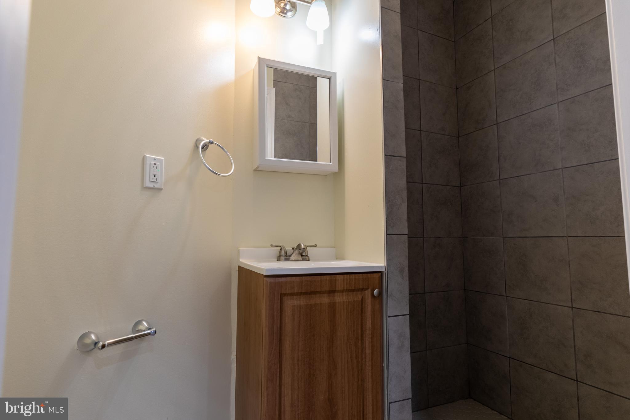 1202 Atwood Road Philadelphia, PA 19151 - Photo 14 of 27 Basement Full Bathroom