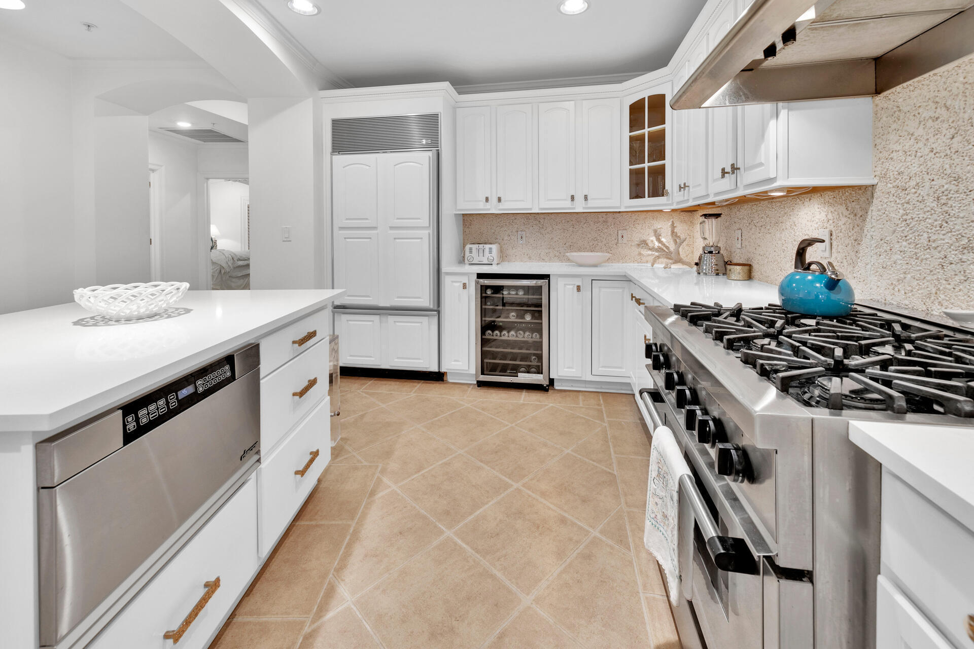56 Blue Mountain Road, Unit B105 Santa Rosa Beach, FL 32459 - Photo 14 of 49 a kitchen with stainless steel appliances granite countertop a stove and a refrigerator
