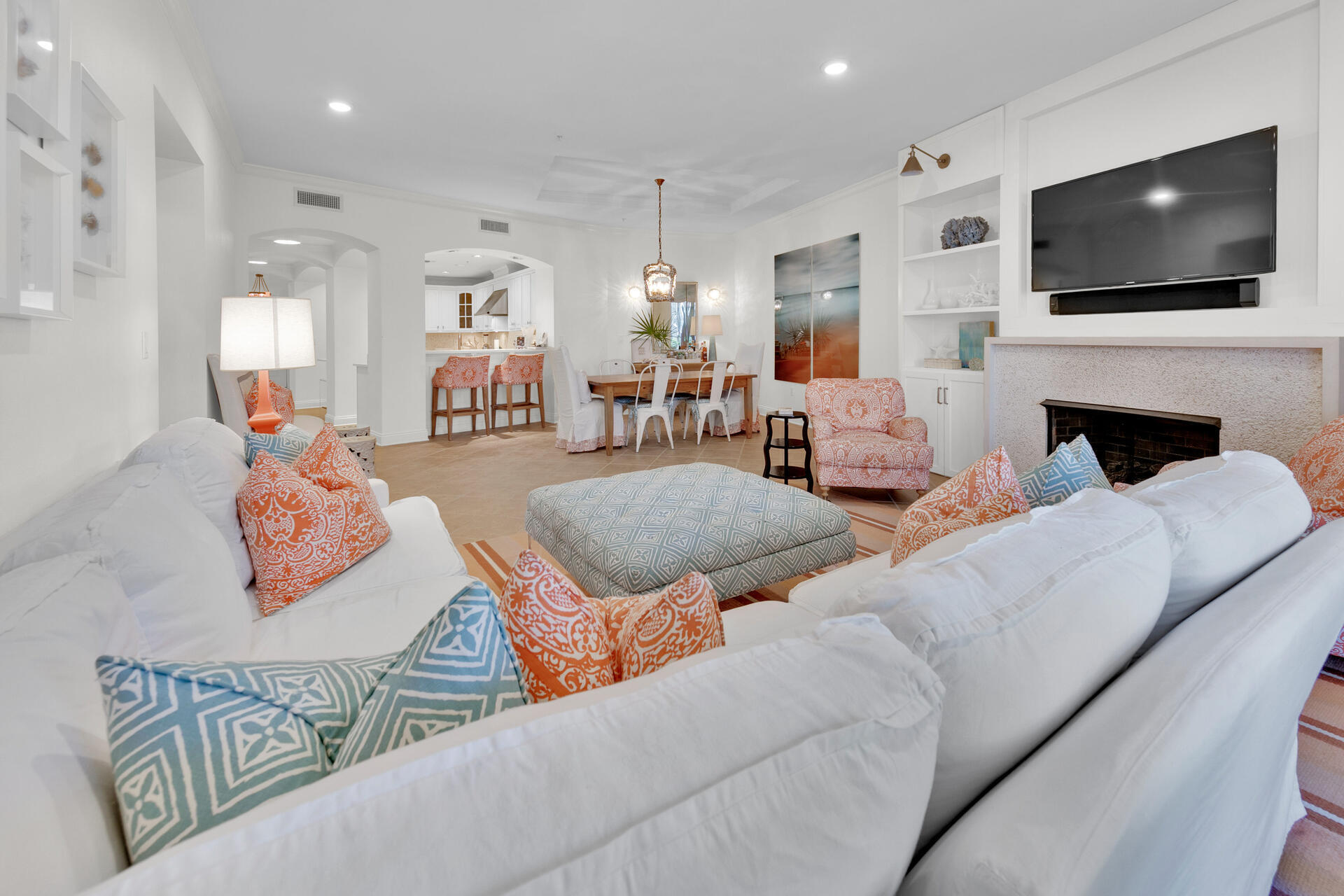 56 Blue Mountain Road, Unit B105 Santa Rosa Beach, FL 32459 - Photo 3 of 49 a living room with furniture and a flat screen tv