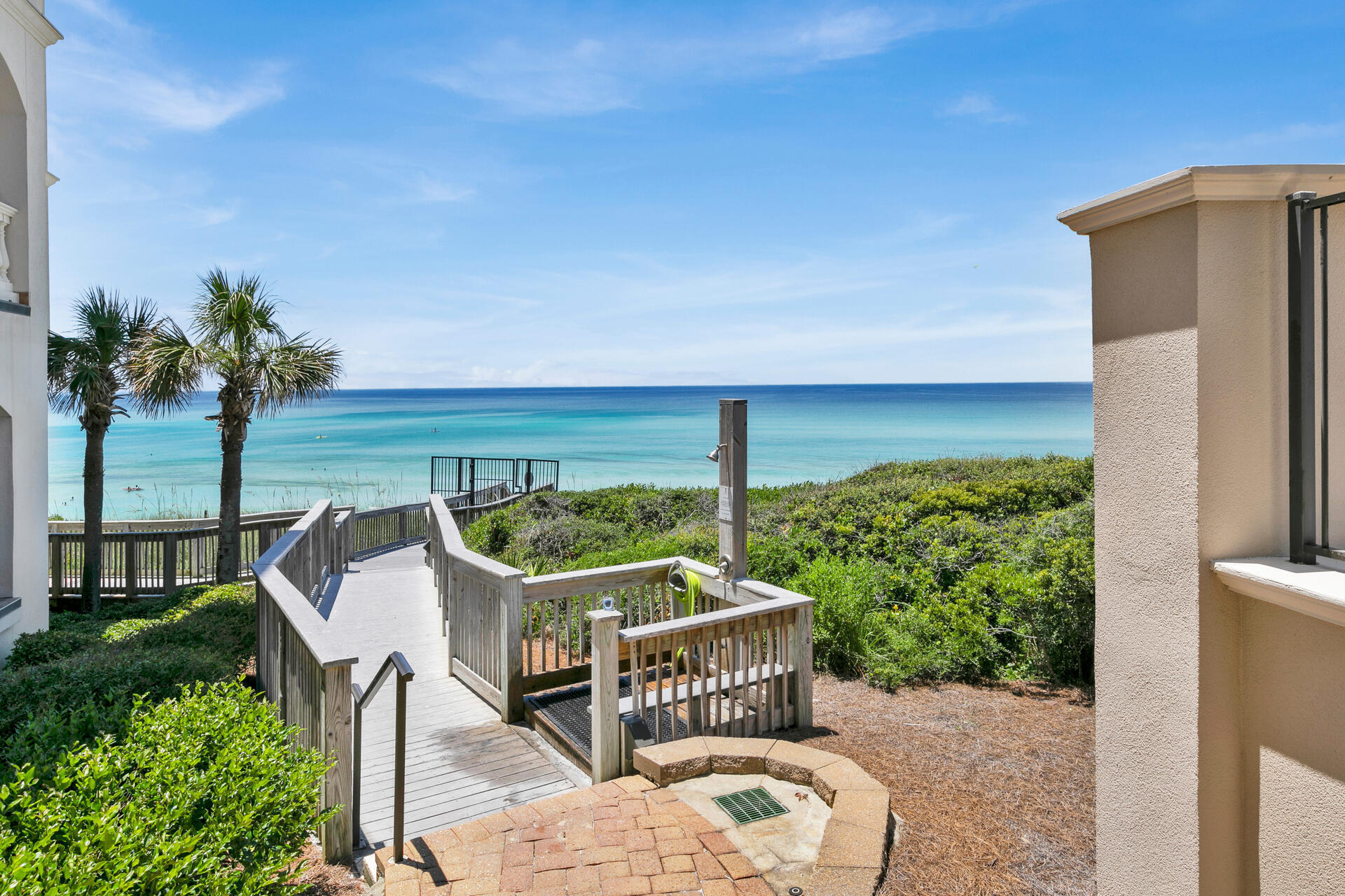 56 Blue Mountain Road, Unit B105 Santa Rosa Beach, FL 32459 - Photo 34 of 49 a view of a chairs and table on the terrace