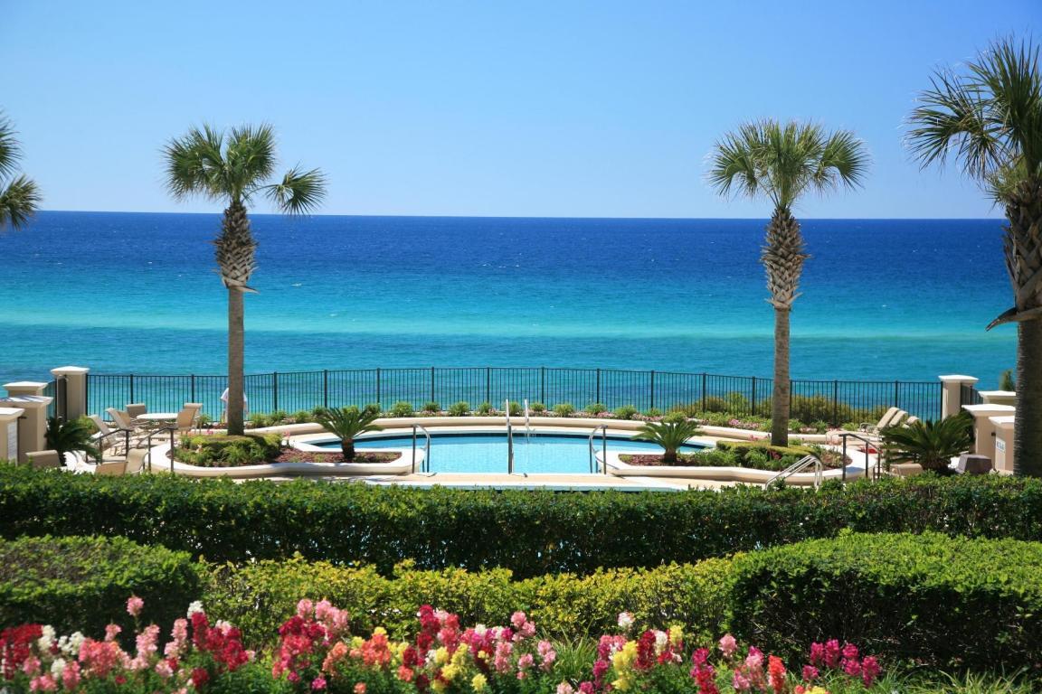 56 Blue Mountain Road, Unit B105 Santa Rosa Beach, FL 32459 - Photo 36 of 49 a view of a lake with a house