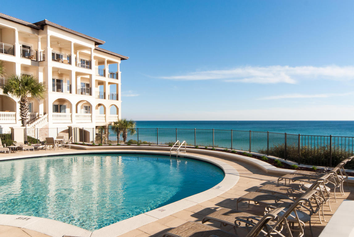 56 Blue Mountain Road, Unit B105 Santa Rosa Beach, FL 32459 - Photo 38 of 49 a view of swimming pool with outdoor seating and lake