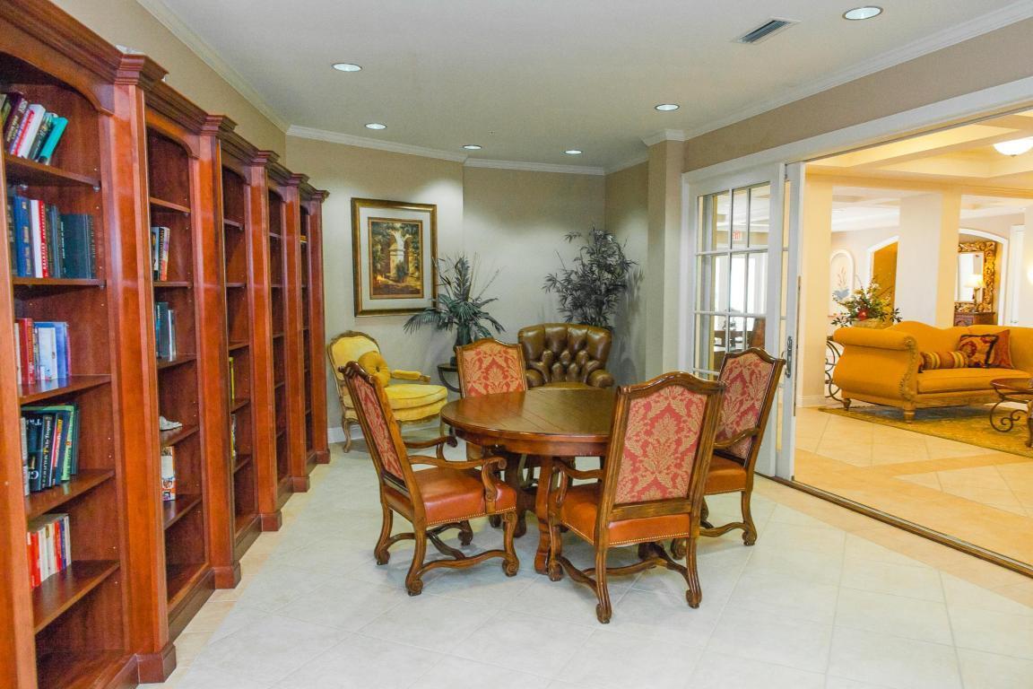 56 Blue Mountain Road, Unit B105 Santa Rosa Beach, FL 32459 - Photo 49 of 49 a dining room with furniture and a floor to ceiling window