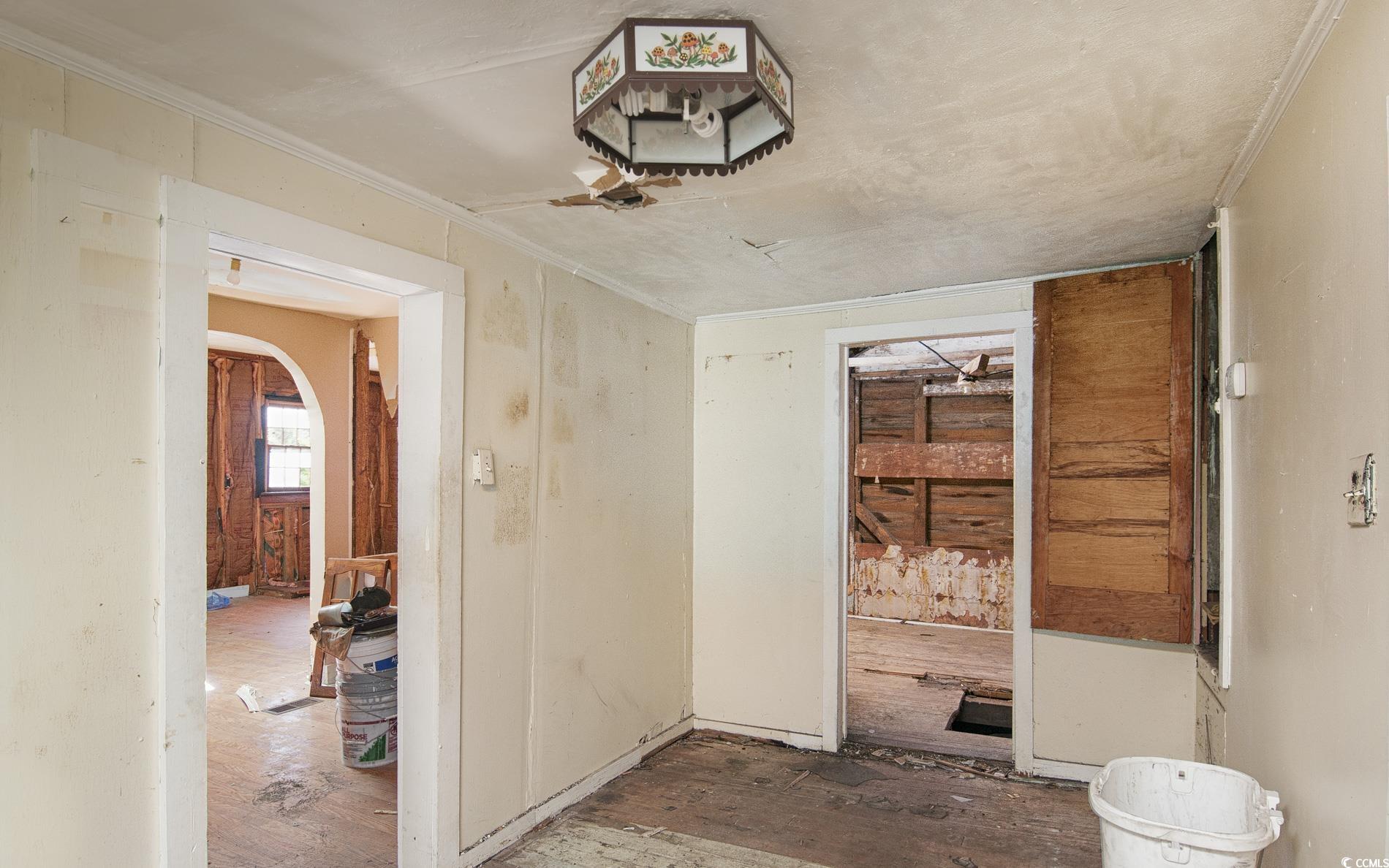 228 St James Street Georgetown, SC 29440 - Photo 8 of 14 Hall with hardwood / wood-style flooring
