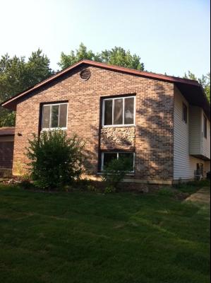 725 Arizona Pass Elk Grove Village, IL 60007 - Photo 1 of 11 a backyard of a house with lots of green space