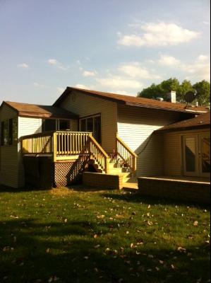 725 Arizona Pass Elk Grove Village, IL 60007 - Photo 2 of 11 a front view of a house with a yard