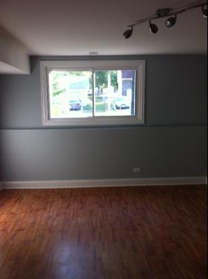 725 Arizona Pass Elk Grove Village, IL 60007 - Photo 11 of 11 an empty room with wooden floor and windows
