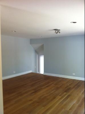 725 Arizona Pass Elk Grove Village, IL 60007 - Photo 4 of 11 a view of an empty room with wooden floor