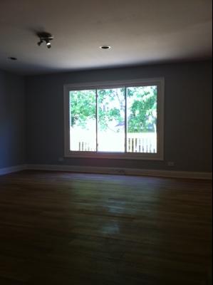 725 Arizona Pass Elk Grove Village, IL 60007 - Photo 5 of 11 a living room with a fireplace