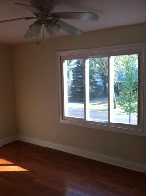 725 Arizona Pass Elk Grove Village, IL 60007 - Photo 7 of 11 a view of a room that has a window in it