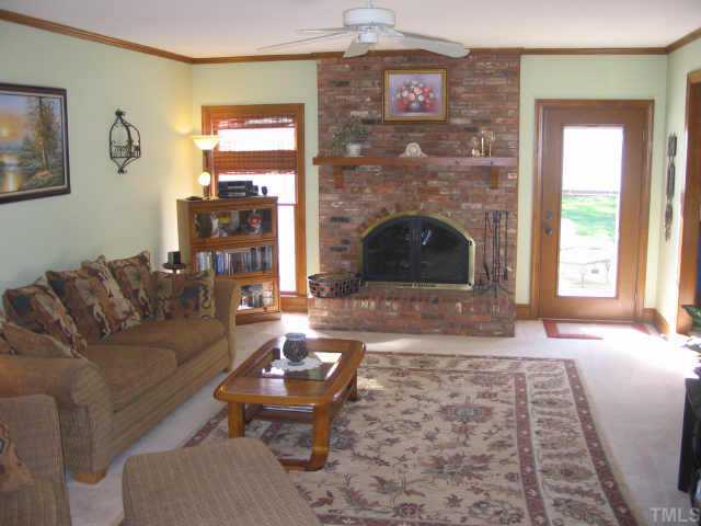 7505 Old Fox Trail Raleigh, NC 27613 - Photo 4 of 12 Real Masonry Arched Fireplace In Living Room