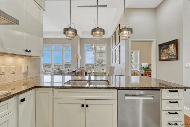 a kitchen with counter top space and a window