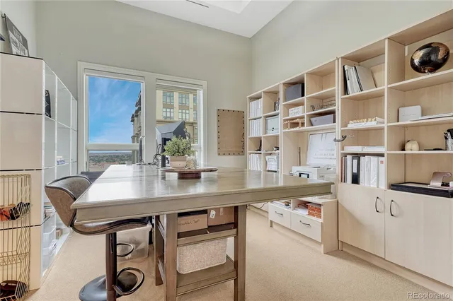 a view of a workspace with furniture