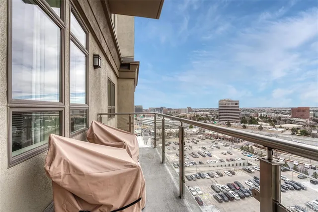 a view of balcony with furniture