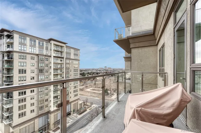 a view of balcony with furniture