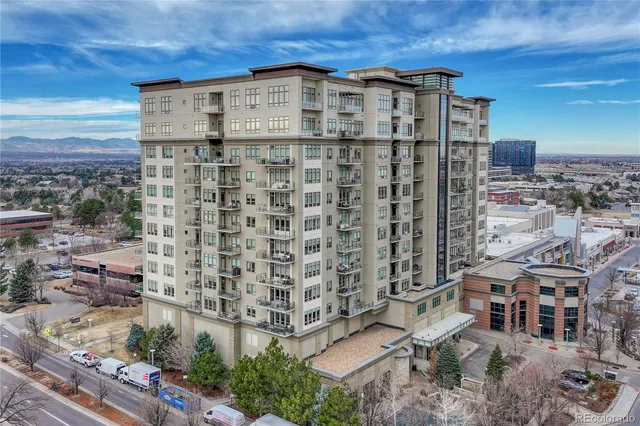 a large building with a clock on the wall