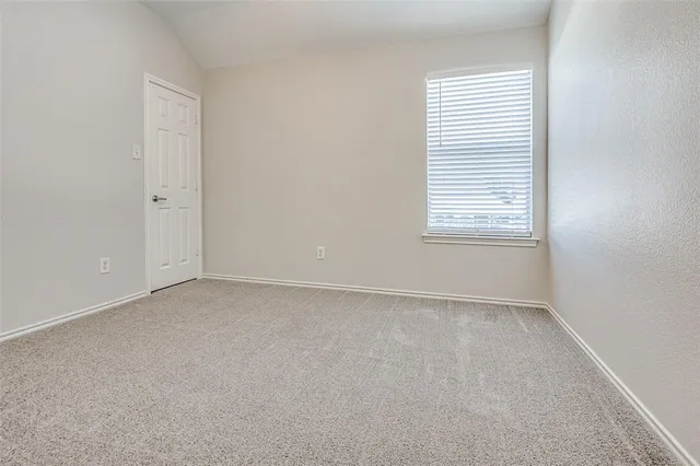 a bathroom with a double vanity sink mirror and shower